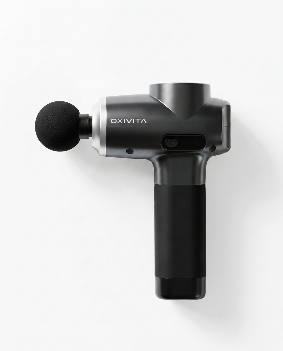 OXIVITA CORE M1 massagepistol med bollhuvud på vit bakgrund